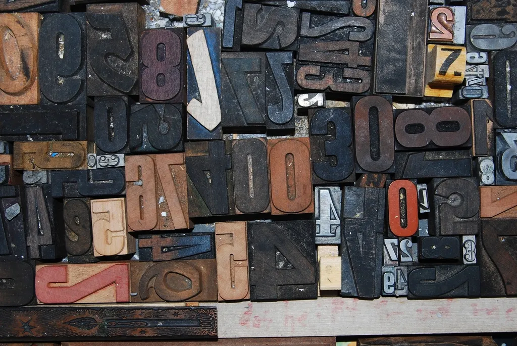 Assorted wooden letterpress type blocks in different sizes and colors